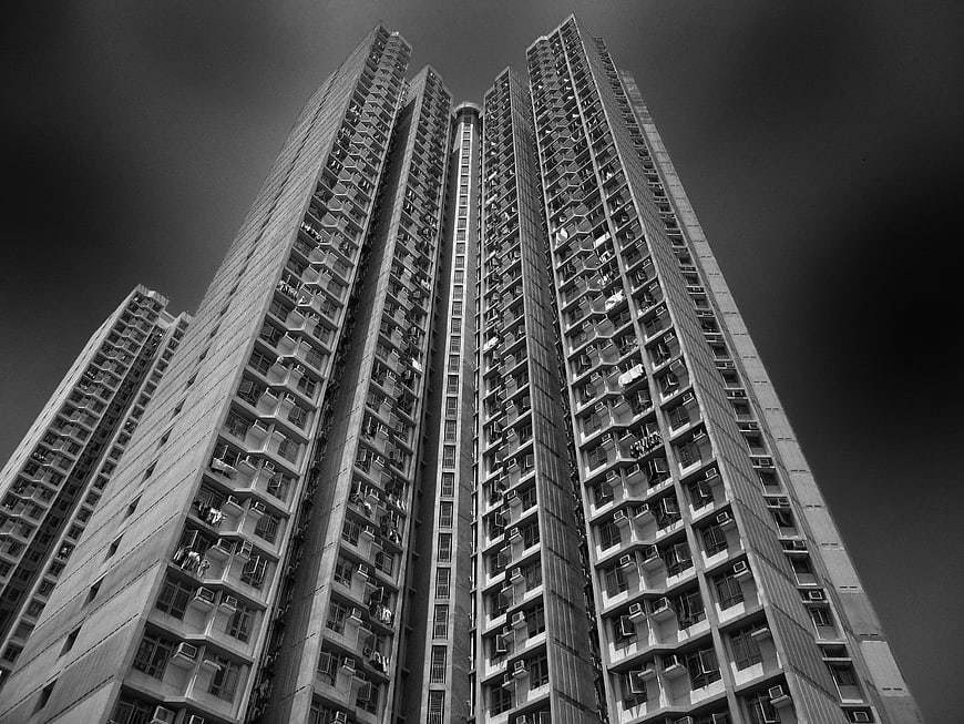 Dramatic Black and White Low Angle View of Hong Kong High-Rise Apartment Building