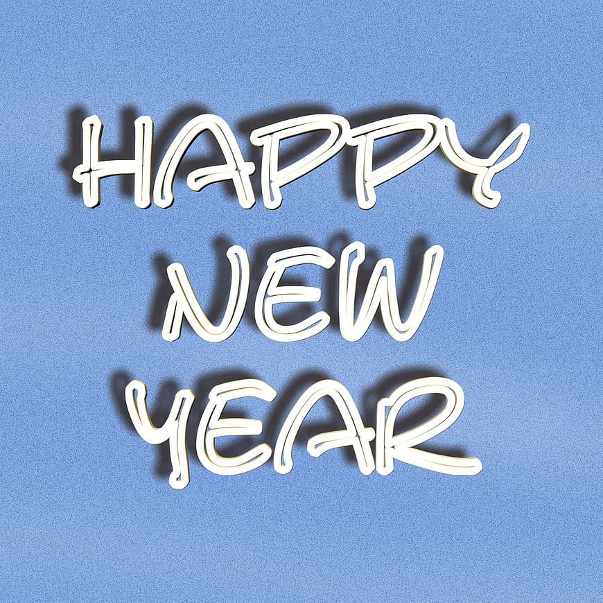 Happy New Year Text Spelled With White Pipe Cleaners On Blue Background