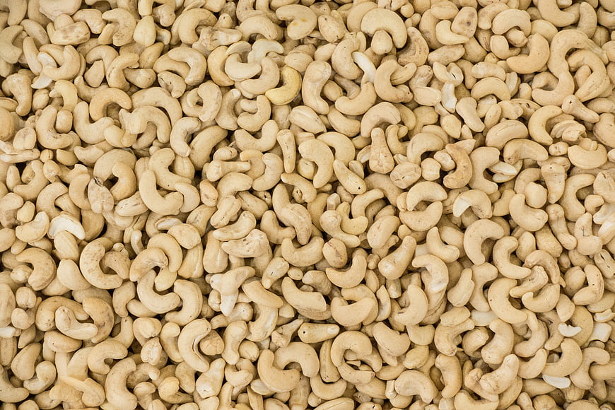 Full frame top view of raw cashew nuts texture
