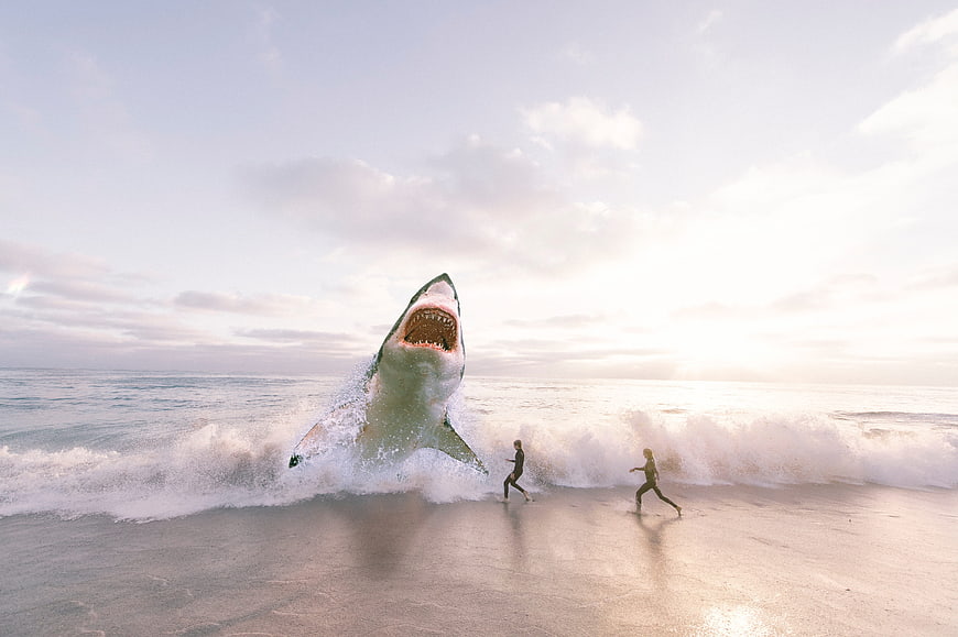 Giant shark jumping out of ocean wave chasing people on beach