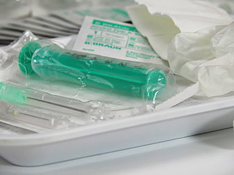 Sterile Medical Injection Kit with Green Syringe and B. Braun Packaging