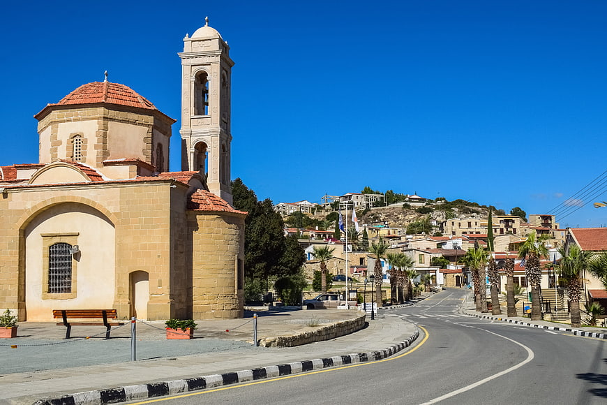 Traditional stone church and bell tower in Cyprus village