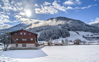Snowy Alpine Chalet with Mountain View