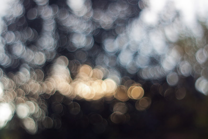 Abstract Bokeh Background with Soft Golden and White Lights