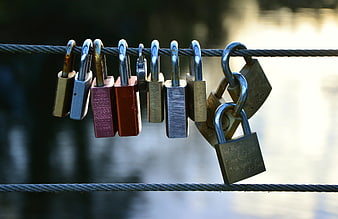 Colorful Love Padlocks on Bridge Cable Railing