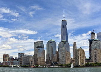 New York City Skyline with One World Trade Center and Sailboats