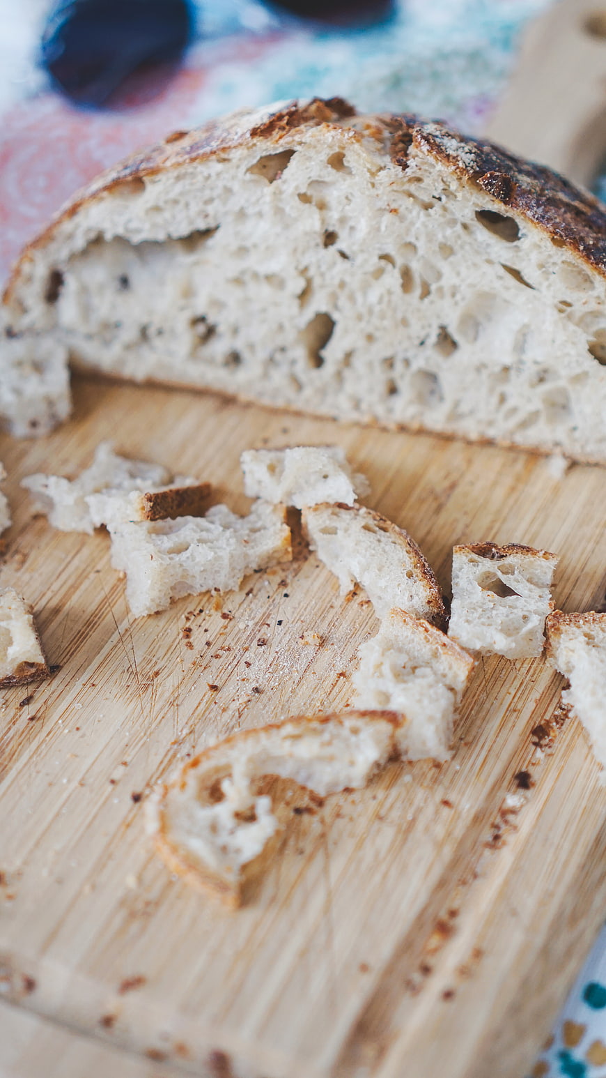 Freshly Baked Artisan Sourdough Bread on Wooden Board