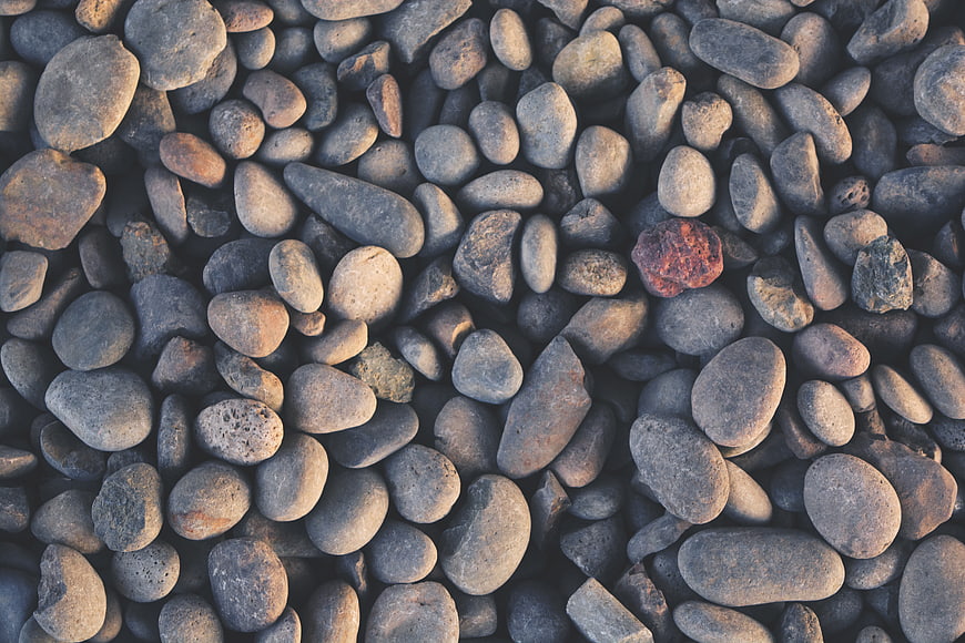 Top View of Smooth Gray Beach Pebbles and Stones