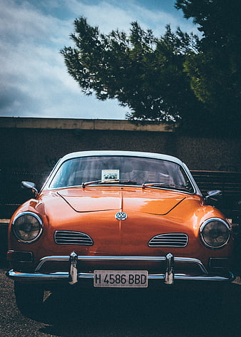 Front view of vintage orange Volkswagen Karmann Ghia