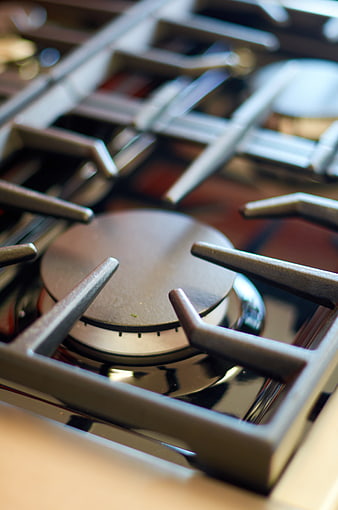 Closeup of modern gas stove burner and grates