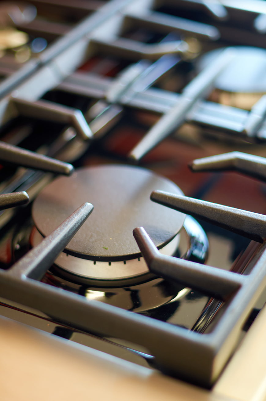 Closeup of modern gas stove burner and grates