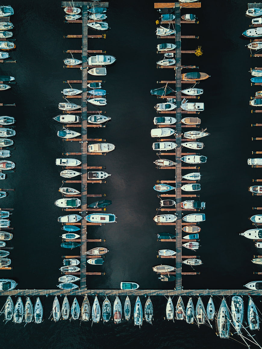 Aerial View of Marina with Docked Boats and Yachts