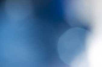 Abstract Blue Bokeh Background with Soft Light Orbs