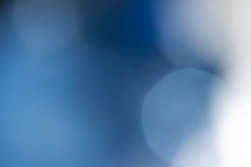 Abstract Blue Bokeh Background with Soft Light Orbs