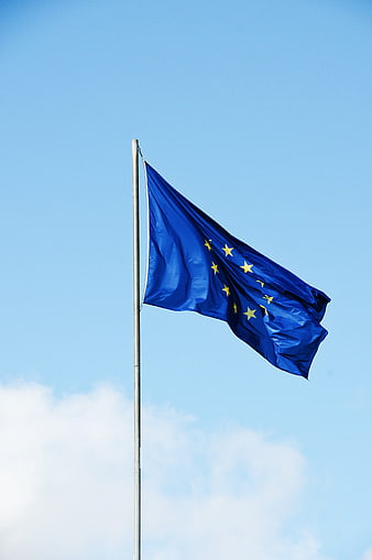 European Union Flag Waving Against Clear Blue Sky