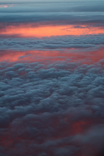 Aerial View of Sunset Clouds with Orange and Blue Hues