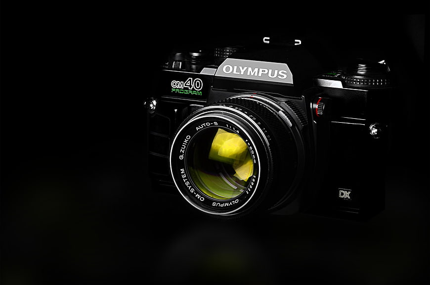 Vintage Olympus OM40 Camera on Black Background