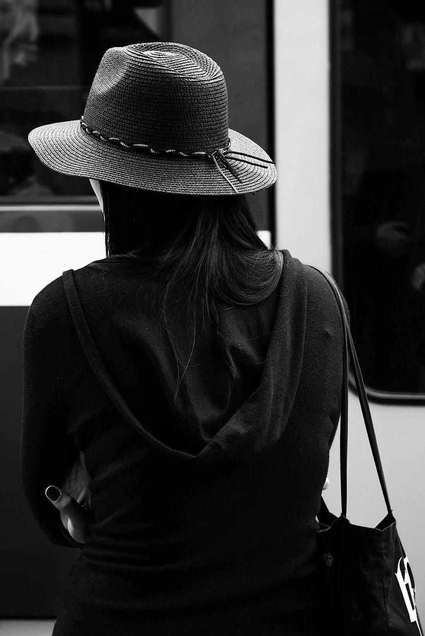 Woman in Hat from Behind Black and White