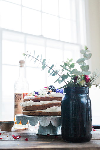 Rustic Naked Cake with Berries and Eucalyptus by Window