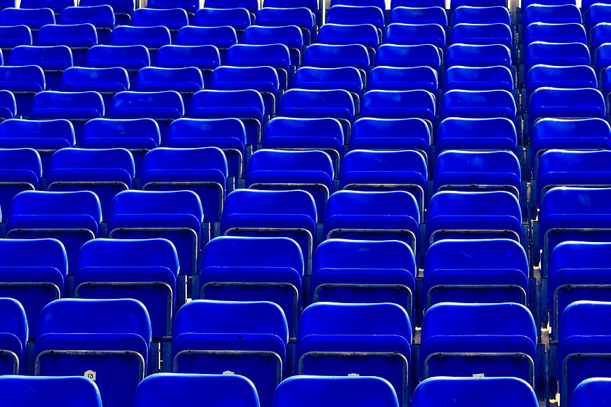 Rows of Empty Blue Stadium Seats
