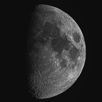 High-Resolution Crescent Moon with Craters on Black Background