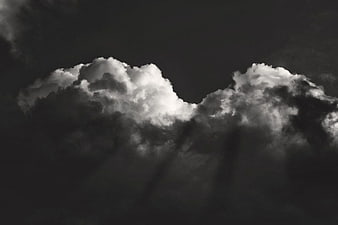 Dramatic Black and White Clouds with Sunbeams