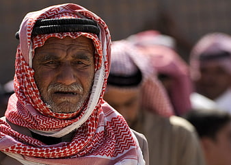 Close-up Portrait of Elderly Middle Eastern Man in Red Keffiyeh