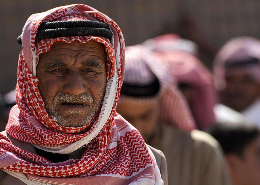 Close-up Portrait of Elderly Middle Eastern Man in Red Keffiyeh