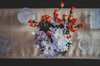Top View of Artificial Flower Bouquet on Wooden Table