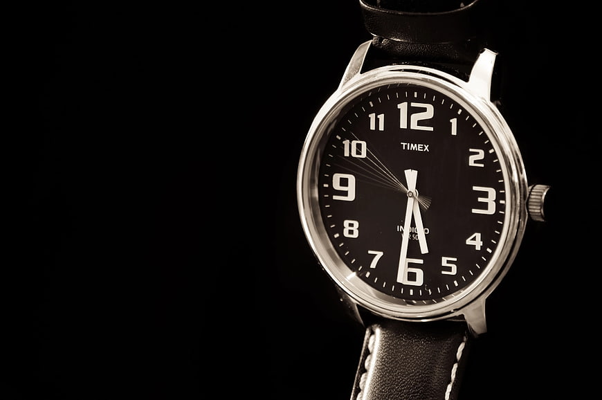 Close-up of Silver Timex Watch with Black Leather Strap