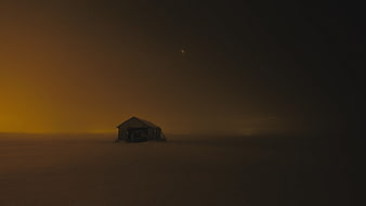 Lonely Cabin in Snowy Landscape Under Starry Night Sky