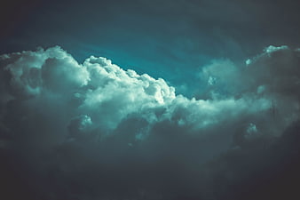 Dramatic Dark Storm Clouds With Teal Sky