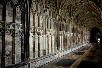 Gothic vaulted stone corridor in historic abbey