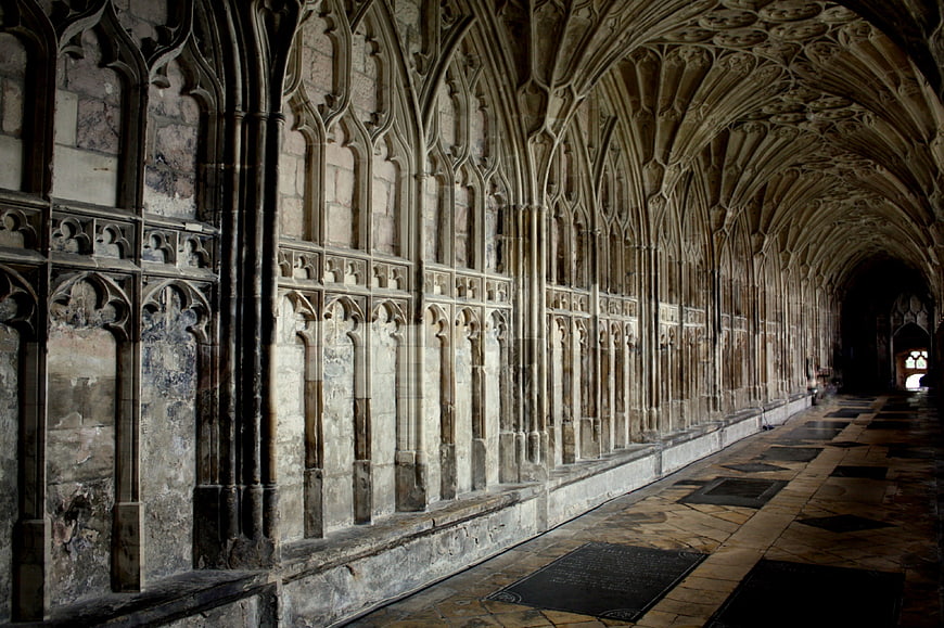 Gothic vaulted stone corridor in historic abbey