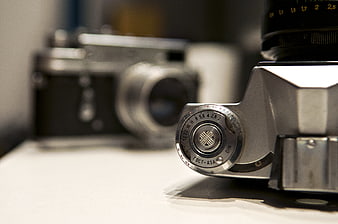 Close-up of vintage film camera ISO dial and lens