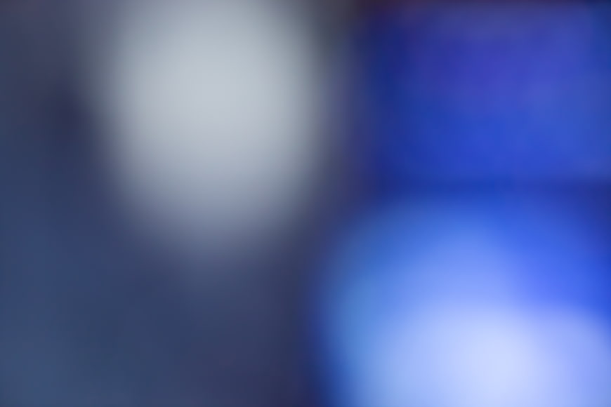 Abstract Blue and White Blurred Background