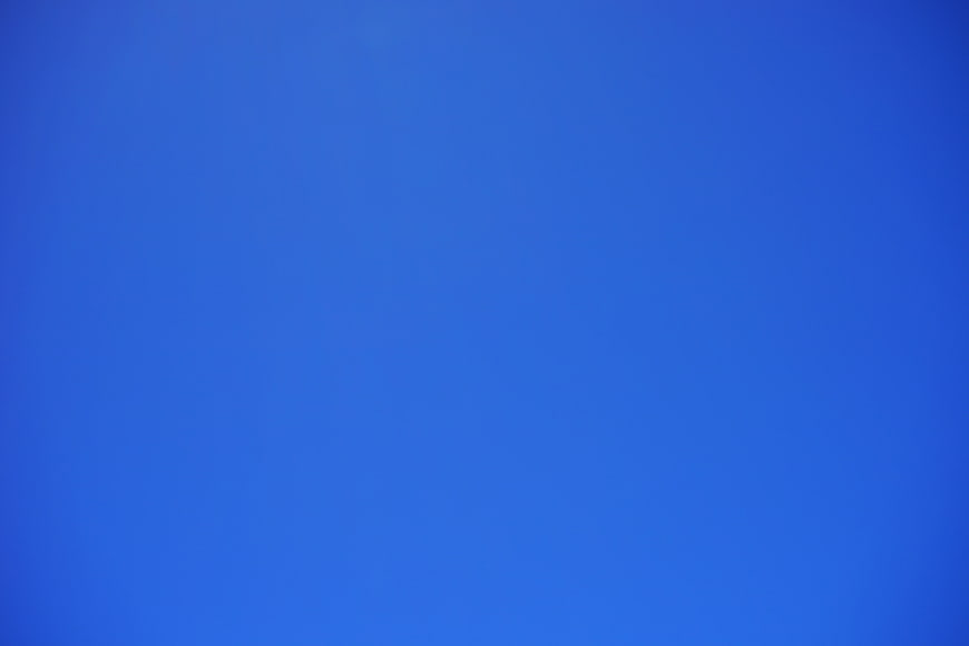 Solid Blue Background With Subtle Vignette Effect