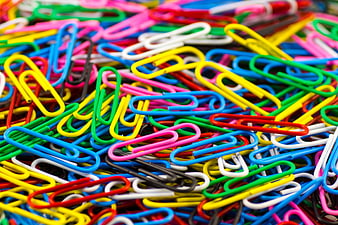 Colorful Paper Clips Scattered in a Pile