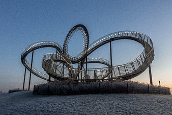 Modern Spiral Staircase Sculpture at Dusk