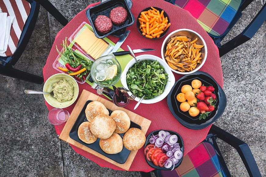 Top View Barbecue Ingredients on Red Tablecloth