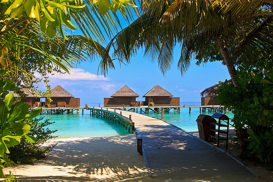 Tropical Overwater Bungalows in Maldives with Wooden Walkway