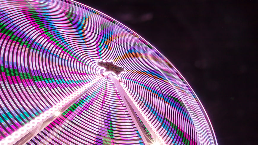 Colorful Ferris Wheel Light Trails at Night