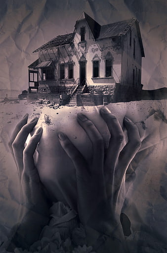 Surreal photomontage of abandoned house held in hands