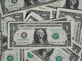 Scattered US One Dollar Bills Flat Lay