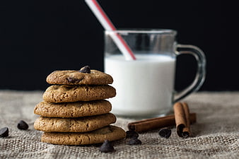 Stack of Chocolate Chip Cookies with Milk and Cinnamon