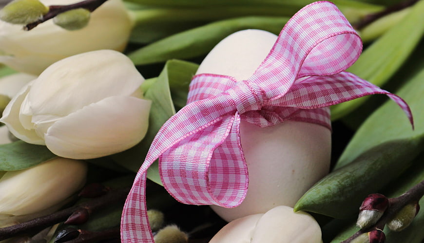 White Easter Egg with Pink Ribbon and White Tulips