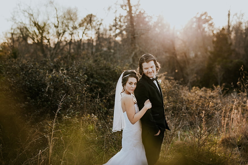 Bride and Groom Embracing in Golden Hour Forest