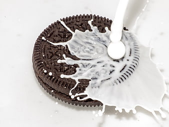 Chocolate Cookie With Milk Splash On White Background