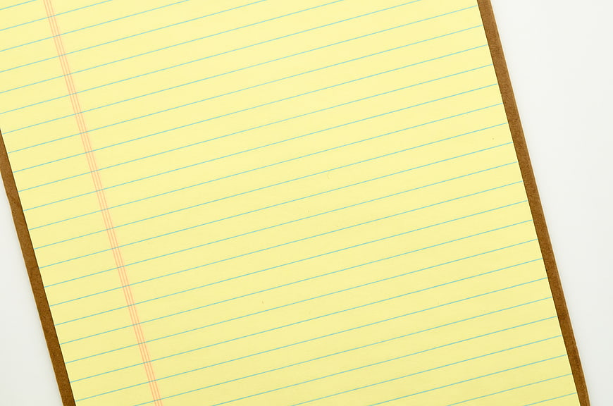 Yellow Lined Notepad on Clipboard