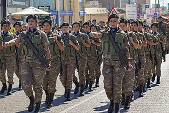 Female soldiers marching in formation during a military parade